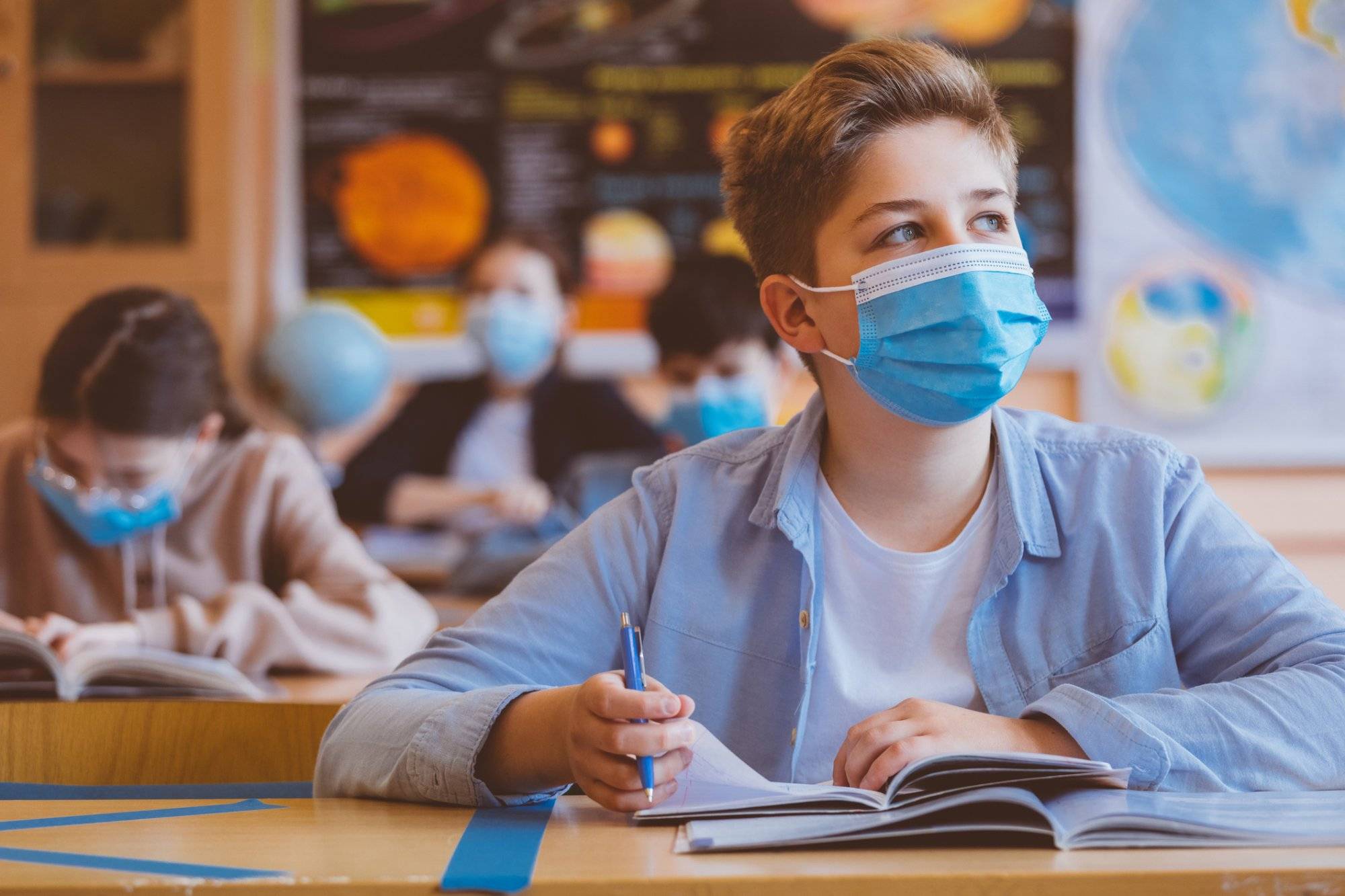 High school boy student at school wearing N95 Face masks